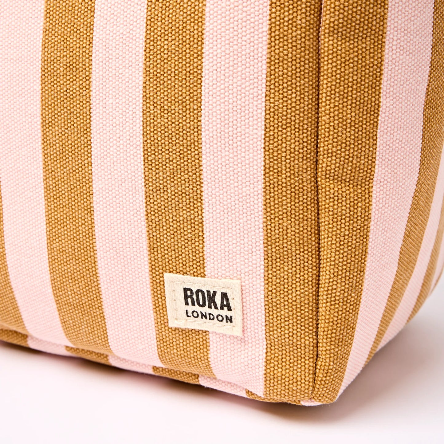 ROKA HAMPSTEAD LUNCH BAG IN ROSE GOLD STRIPE